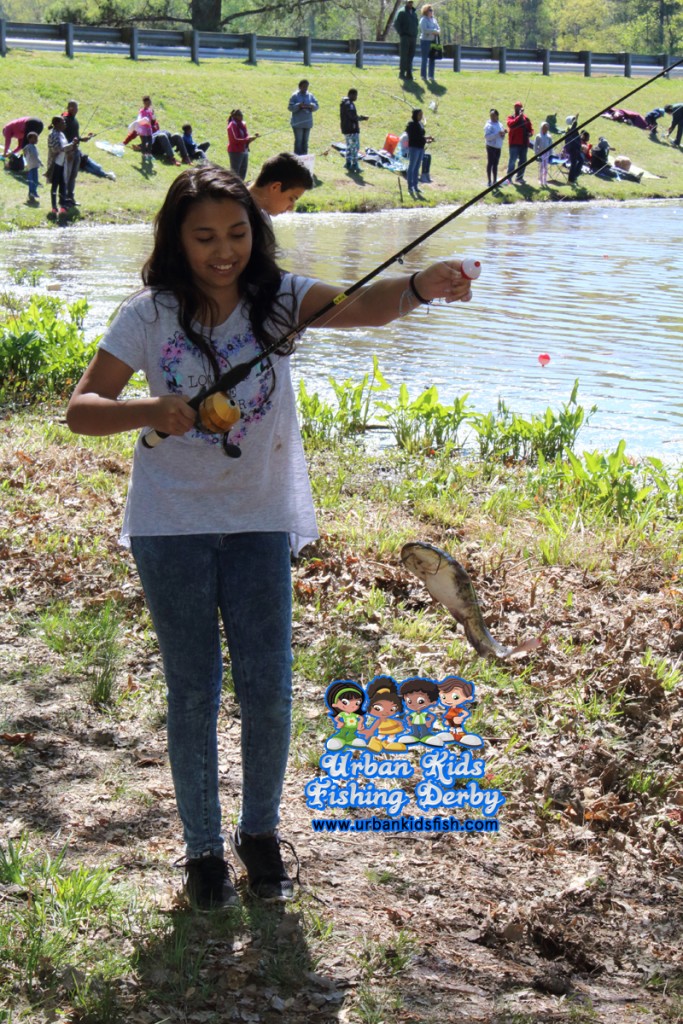 Arianna U. is Urban Kids Fishing Derby Atlanta biggest catch winner. 